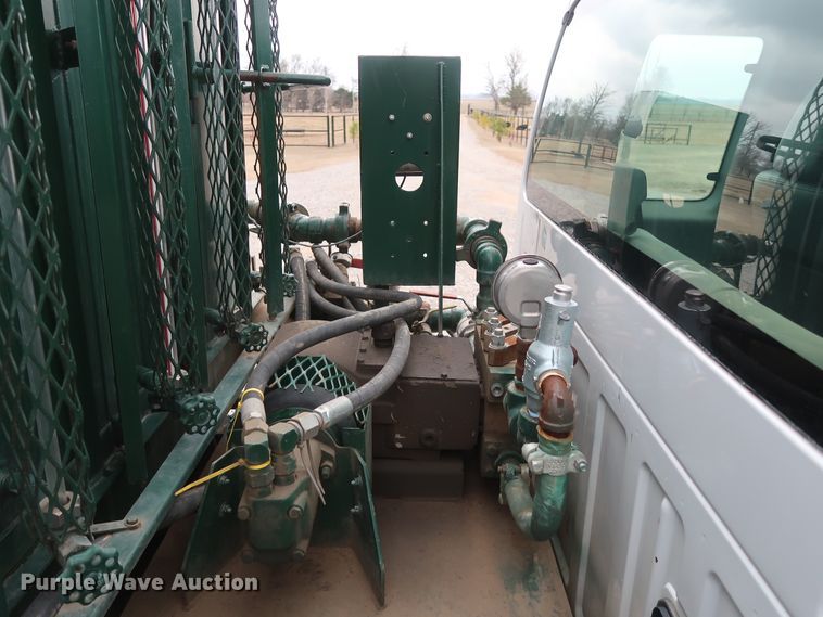 image for item GD9979 2012 Ford F550 Super Duty XL SuperCab flatbed treater truck