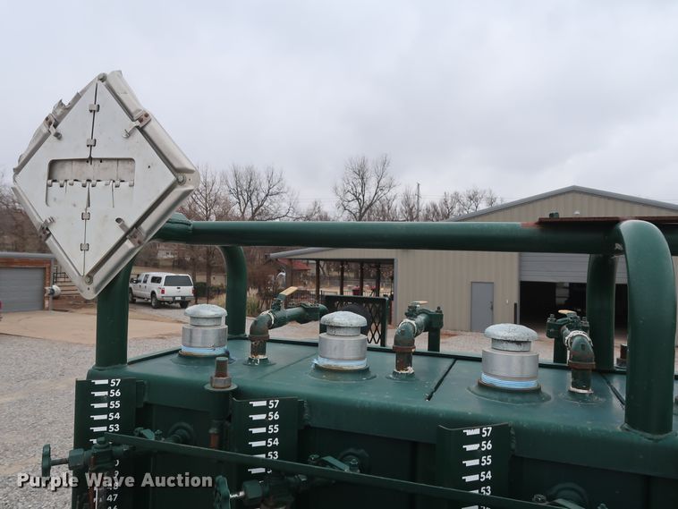 image for item GD9979 2012 Ford F550 Super Duty XL SuperCab flatbed treater truck