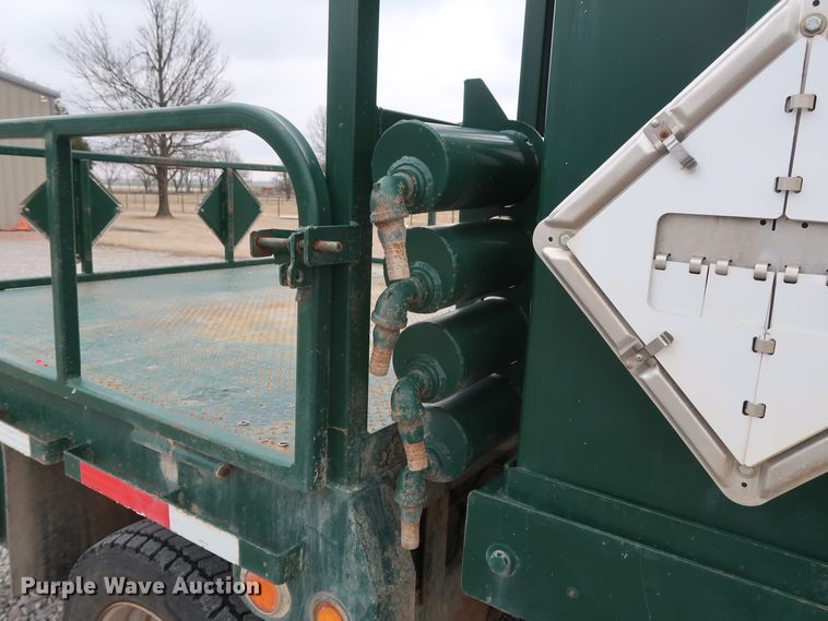 image for item GD9979 2012 Ford F550 Super Duty XL SuperCab flatbed treater truck