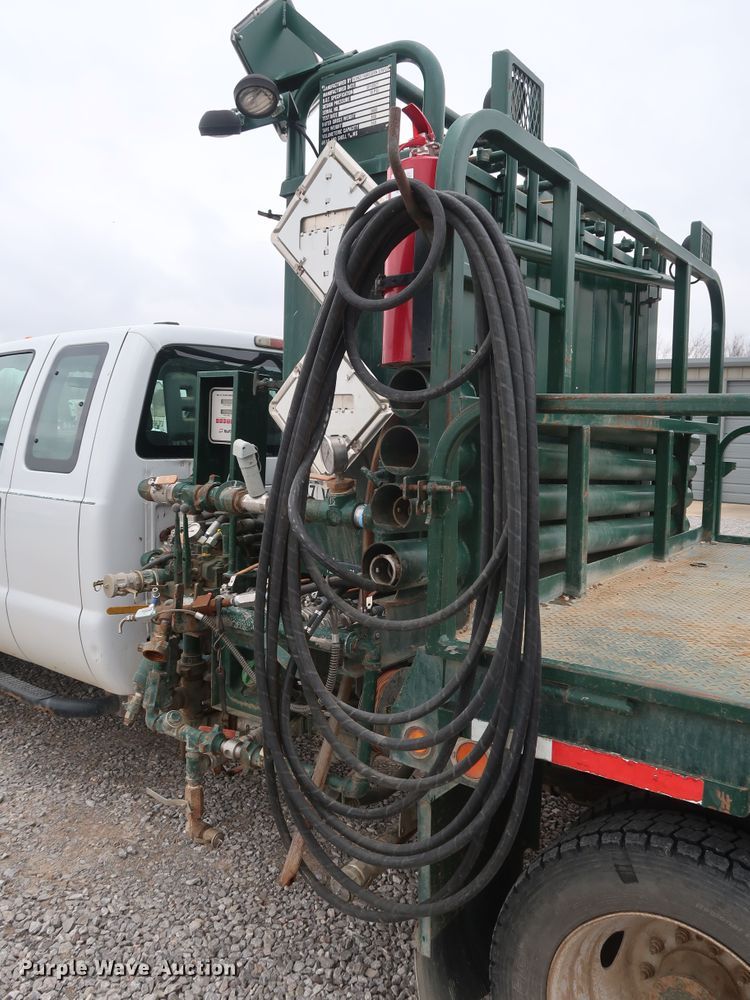 image for item GD9979 2012 Ford F550 Super Duty XL SuperCab flatbed treater truck