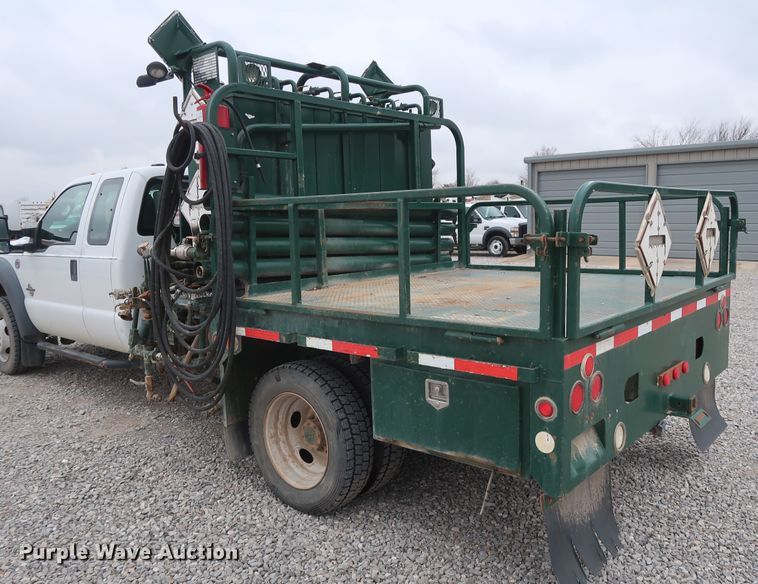 image for item GD9979 2012 Ford F550 Super Duty XL SuperCab flatbed treater truck