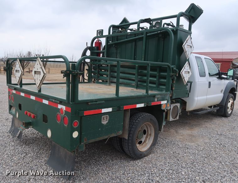 image for item GD9979 2012 Ford F550 Super Duty XL SuperCab flatbed treater truck