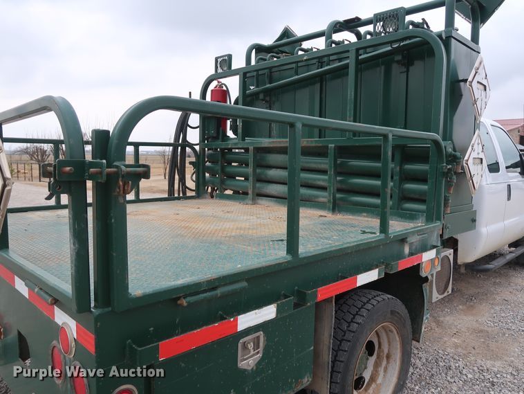image for item GD9979 2012 Ford F550 Super Duty XL SuperCab flatbed treater truck