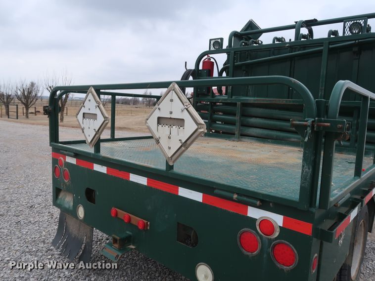 image for item GD9979 2012 Ford F550 Super Duty XL SuperCab flatbed treater truck