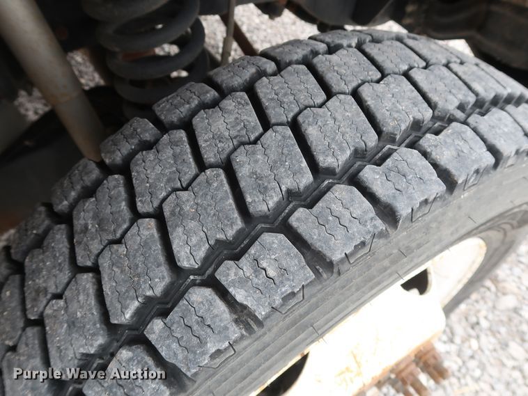 image for item GD9979 2012 Ford F550 Super Duty XL SuperCab flatbed treater truck