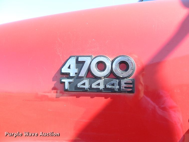 image for item DE4439 1999 International 4700 flatbed truck