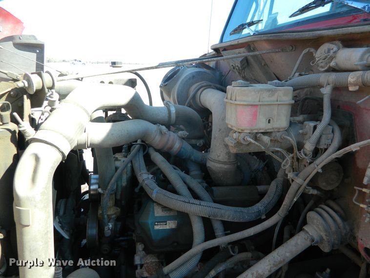 image for item DE4439 1999 International 4700 flatbed truck