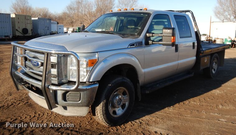 image for item DF5872 2011 Ford F350 Super Duty Crew Cab bale bed pickup truck