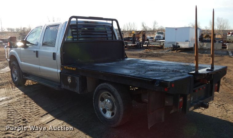 image for item DF5872 2011 Ford F350 Super Duty Crew Cab bale bed pickup truck