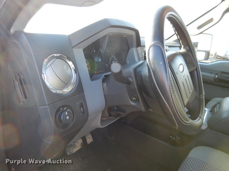 image for item DF5872 2011 Ford F350 Super Duty Crew Cab bale bed pickup truck