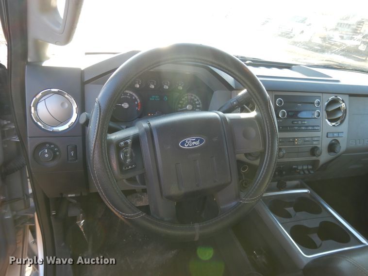 image for item DF5872 2011 Ford F350 Super Duty Crew Cab bale bed pickup truck