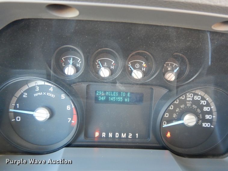 image for item DF5872 2011 Ford F350 Super Duty Crew Cab bale bed pickup truck