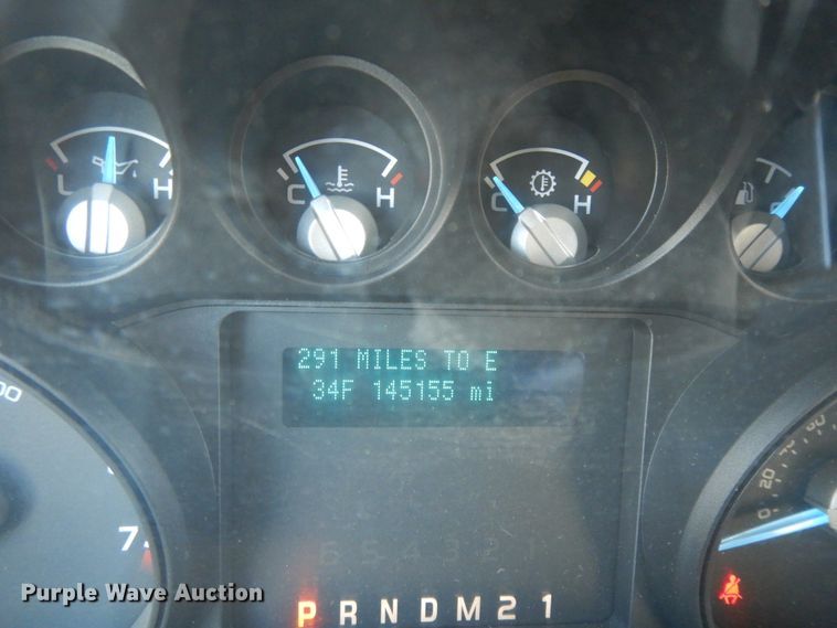 image for item DF5872 2011 Ford F350 Super Duty Crew Cab bale bed pickup truck