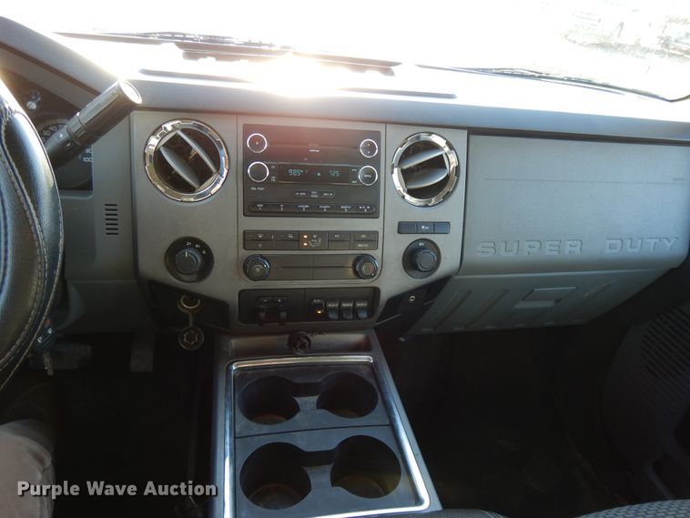 image for item DF5872 2011 Ford F350 Super Duty Crew Cab bale bed pickup truck