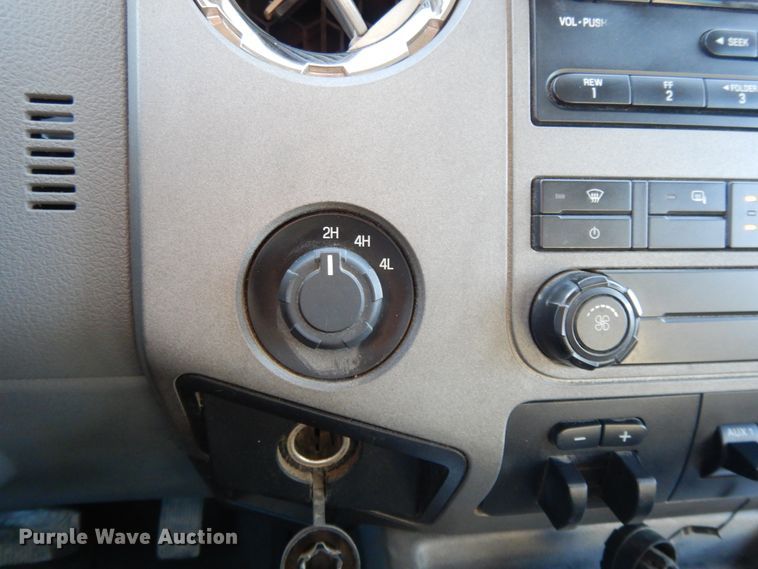 image for item DF5872 2011 Ford F350 Super Duty Crew Cab bale bed pickup truck