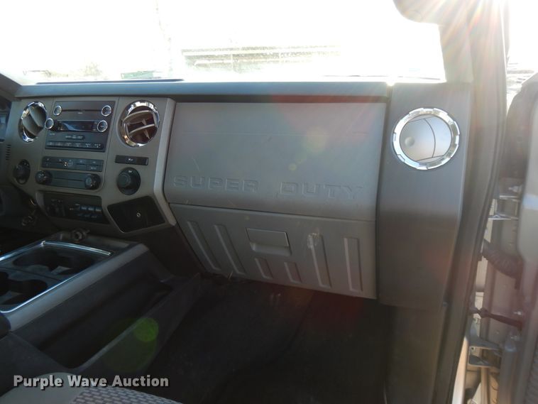 image for item DF5872 2011 Ford F350 Super Duty Crew Cab bale bed pickup truck