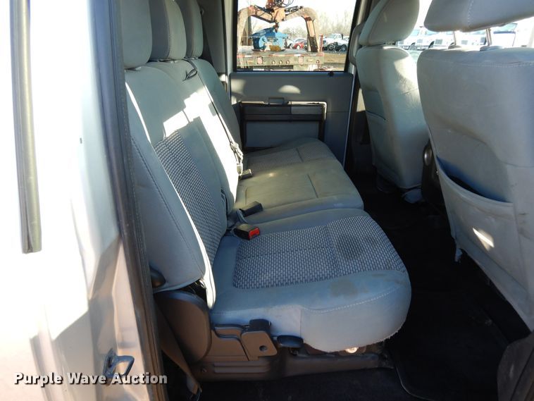 image for item DF5872 2011 Ford F350 Super Duty Crew Cab bale bed pickup truck