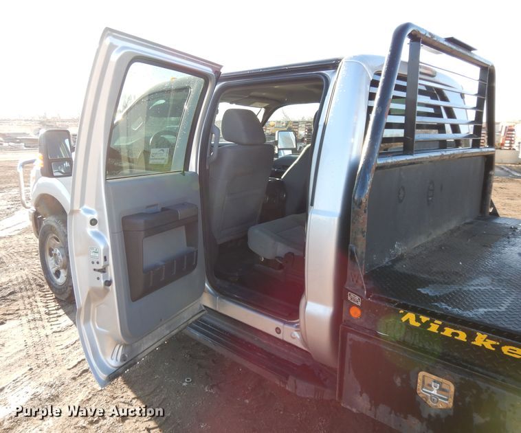 image for item DF5872 2011 Ford F350 Super Duty Crew Cab bale bed pickup truck