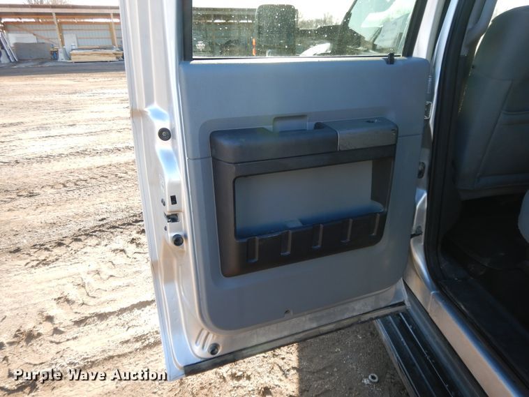 image for item DF5872 2011 Ford F350 Super Duty Crew Cab bale bed pickup truck