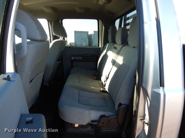 image for item DF5872 2011 Ford F350 Super Duty Crew Cab bale bed pickup truck