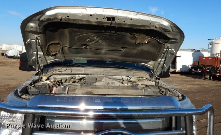 image for item DF5872 2011 Ford F350 Super Duty Crew Cab bale bed pickup truck