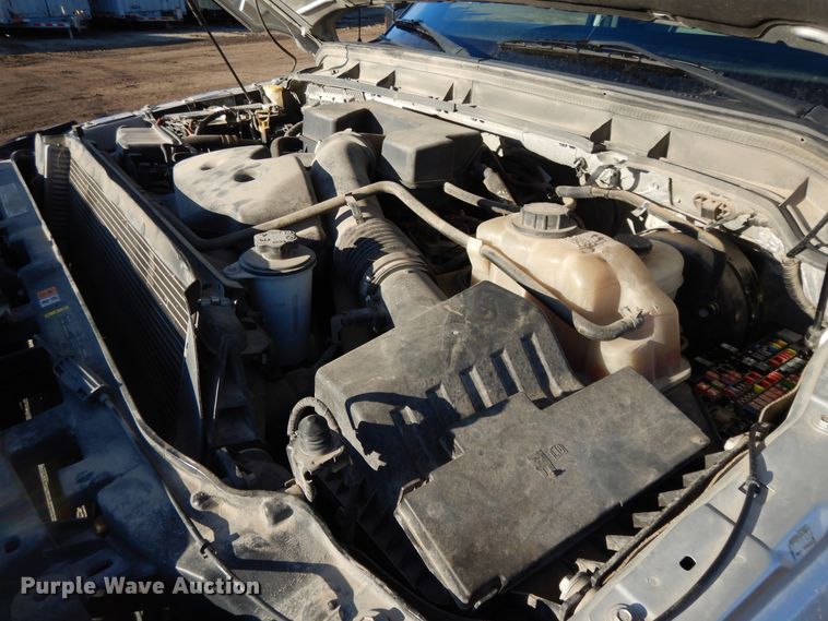 image for item DF5872 2011 Ford F350 Super Duty Crew Cab bale bed pickup truck