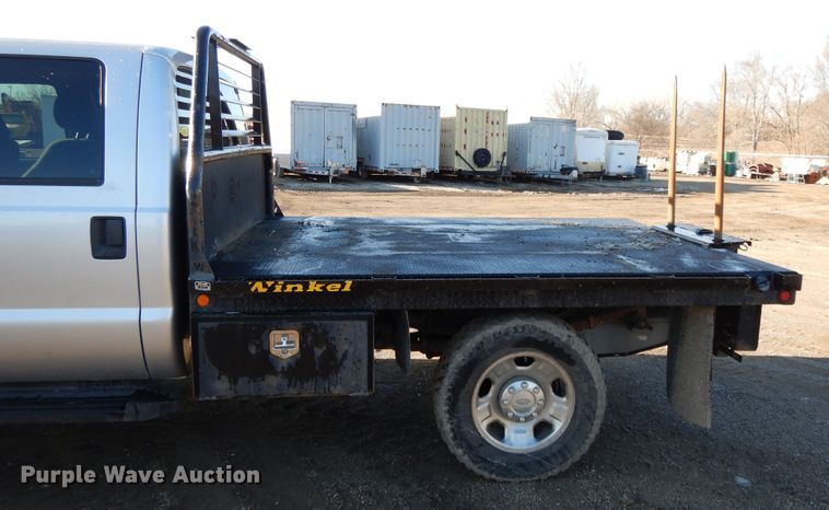 image for item DF5872 2011 Ford F350 Super Duty Crew Cab bale bed pickup truck