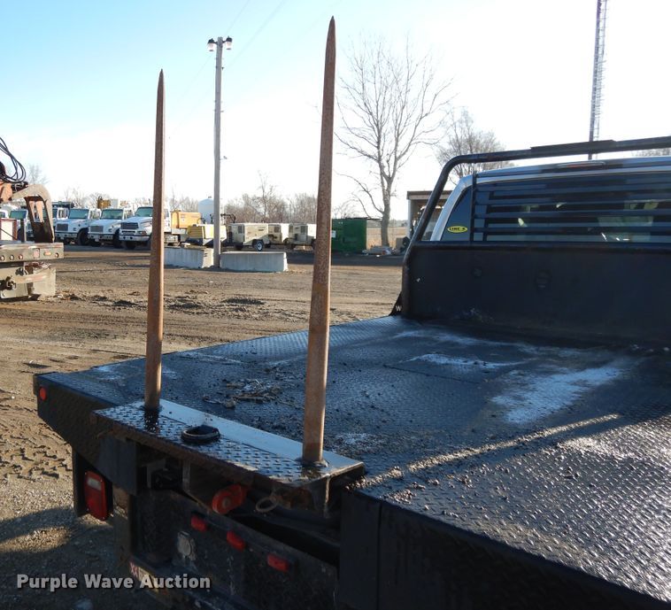 image for item DF5872 2011 Ford F350 Super Duty Crew Cab bale bed pickup truck