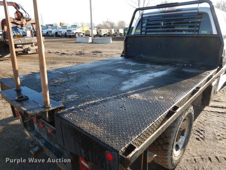 image for item DF5872 2011 Ford F350 Super Duty Crew Cab bale bed pickup truck