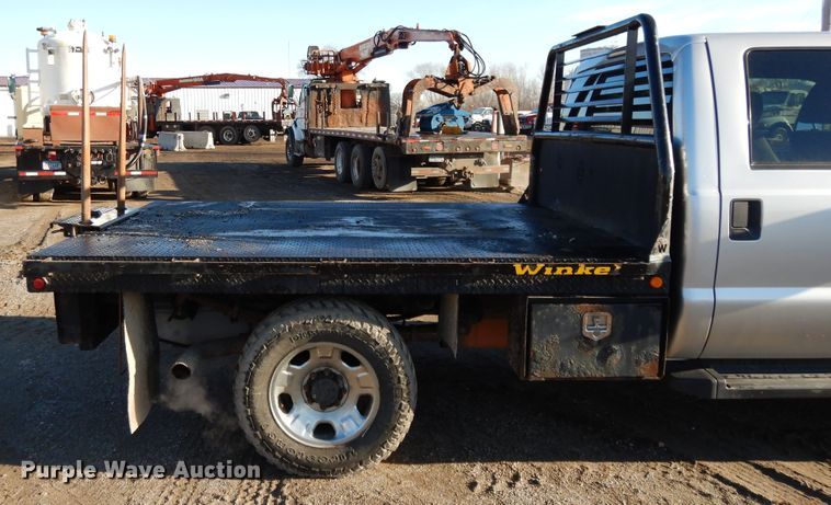 image for item DF5872 2011 Ford F350 Super Duty Crew Cab bale bed pickup truck