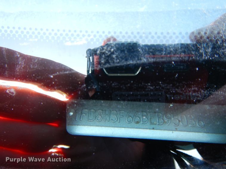 image for item DF5872 2011 Ford F350 Super Duty Crew Cab bale bed pickup truck