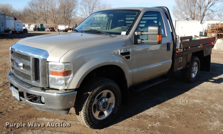 image for item DF5874 2009 Ford F250 Super Duty flatbed pickup truck