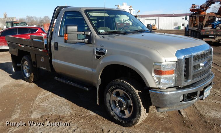image for item DF5874 2009 Ford F250 Super Duty flatbed pickup truck