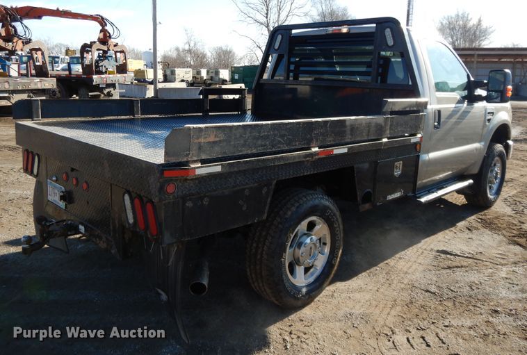 image for item DF5874 2009 Ford F250 Super Duty flatbed pickup truck