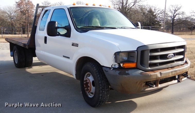 image for item GK9040 2001 Ford F350 Super Duty SuperCab bale bed pickup truck