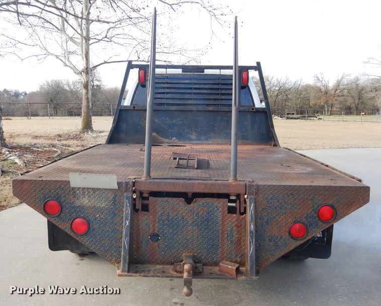 image for item GK9040 2001 Ford F350 Super Duty SuperCab bale bed pickup truck