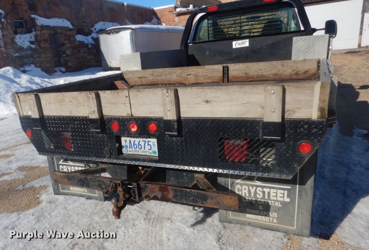 image for item GW9506 2006 Ford F350 Super Duty flatbed pickup truck