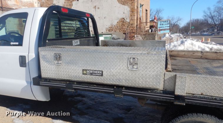 image for item GW9506 2006 Ford F350 Super Duty flatbed pickup truck