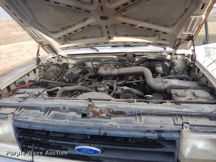 image for item GW9524 1988 Ford F350 utility bed pickup truck with crane