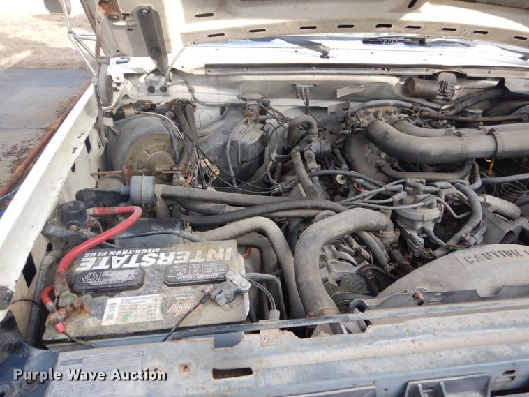 image for item GW9524 1988 Ford F350 utility bed pickup truck with crane