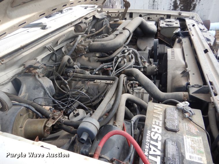 image for item GW9524 1988 Ford F350 utility bed pickup truck with crane