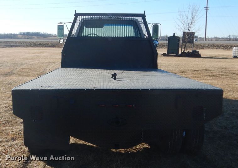 image for item GW9539 1999 GMC TopKick flatbed truck
