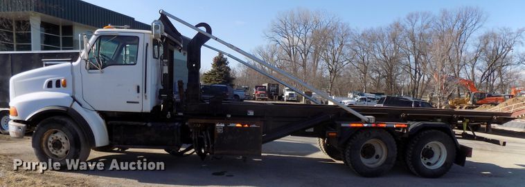 image for item DG2531 2000 Sterling L-Line roll-off container truck