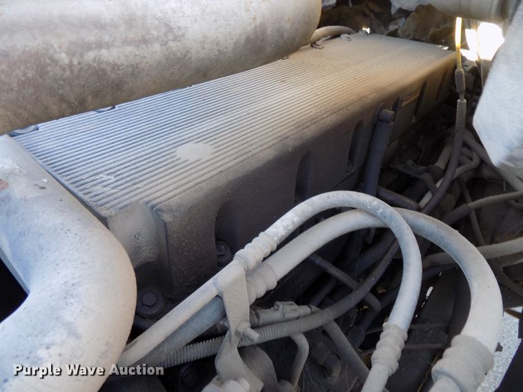 image for item DG2531 2000 Sterling L-Line roll-off container truck