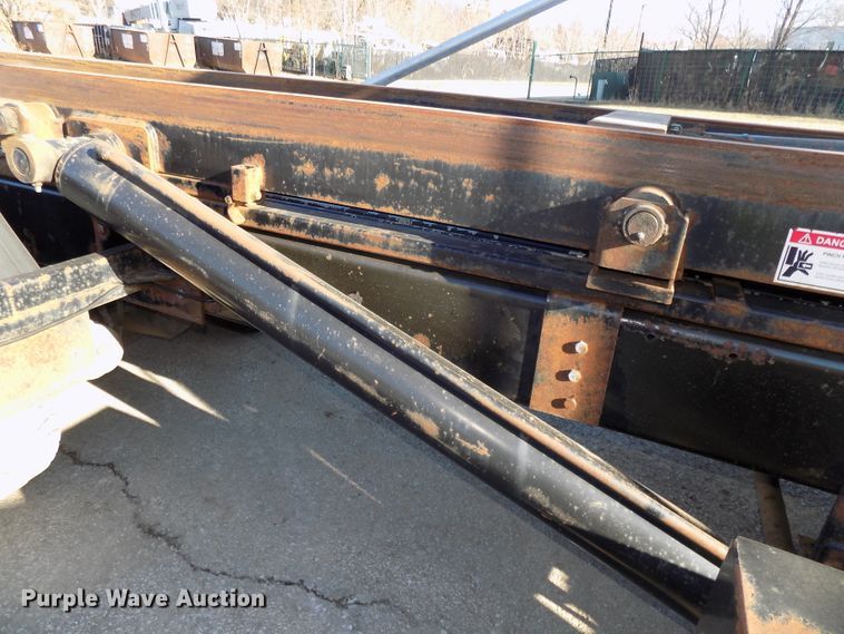 image for item DG2531 2000 Sterling L-Line roll-off container truck