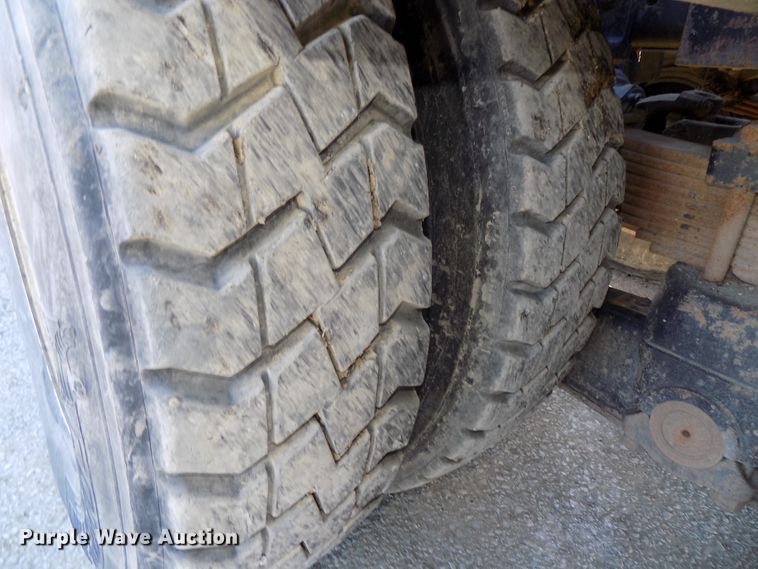 image for item DG2531 2000 Sterling L-Line roll-off container truck