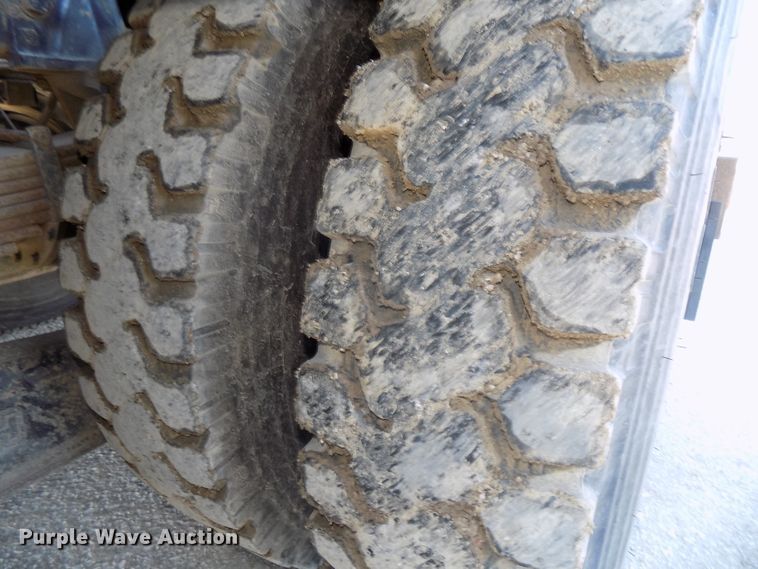 image for item DG2531 2000 Sterling L-Line roll-off container truck