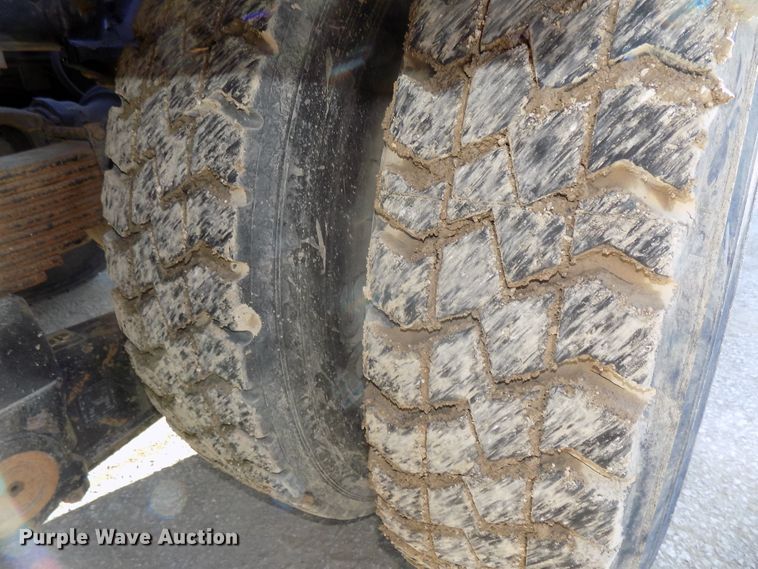 image for item DG2531 2000 Sterling L-Line roll-off container truck