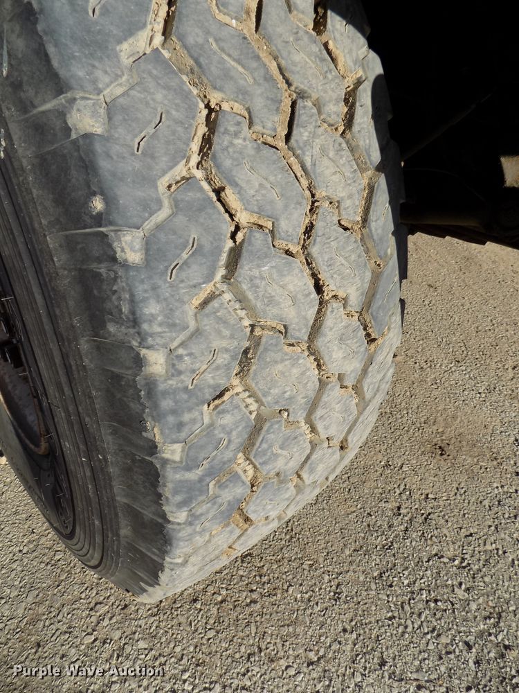 image for item DG2531 2000 Sterling L-Line roll-off container truck