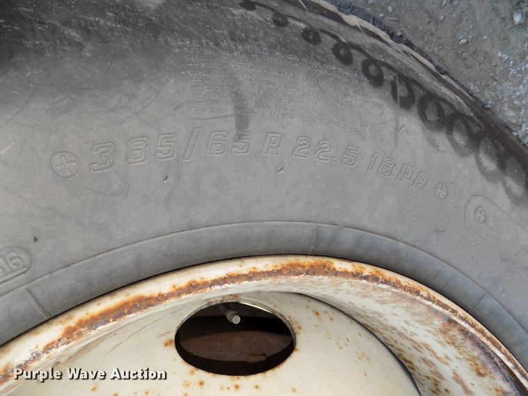 image for item DG2531 2000 Sterling L-Line roll-off container truck